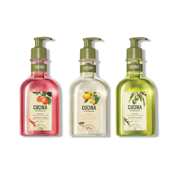 Three bottles of Cucina hand soap arranged in a row, against a white background