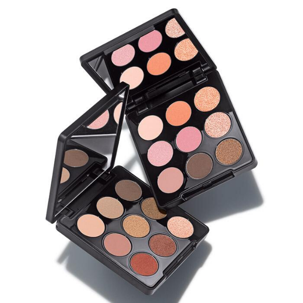 Two open compacts of Mono Pop Eyeshadow, against a white background