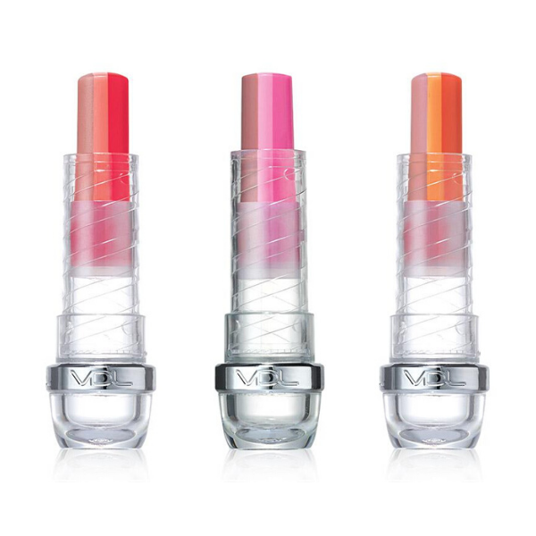 Three tubes of Tint Bar triple shot arranged in a row, against a white background