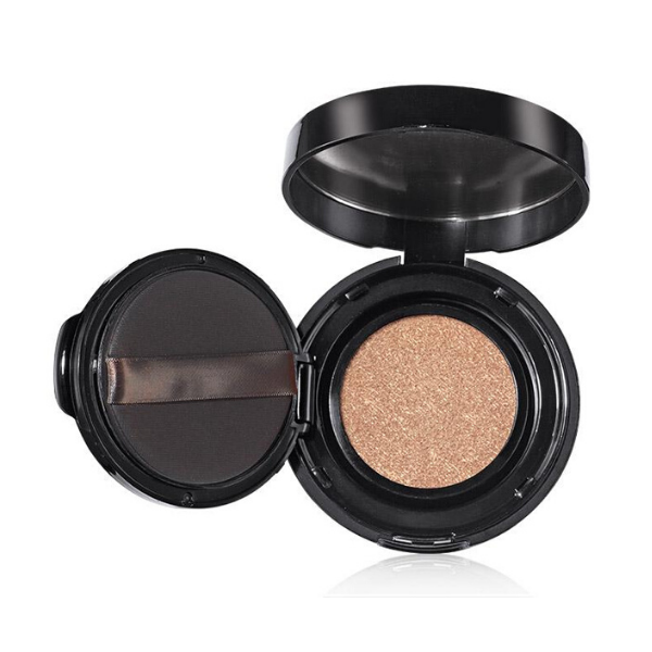Compact of Colors of Love Kiss Me Cushion Highlighter in the shade Golden Lily, against a white background