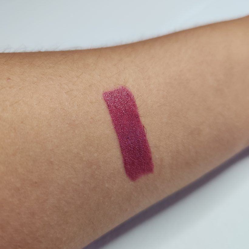 Arm swatch showing the shade Eclipse in Avon's Glimmer Satin Lipstick