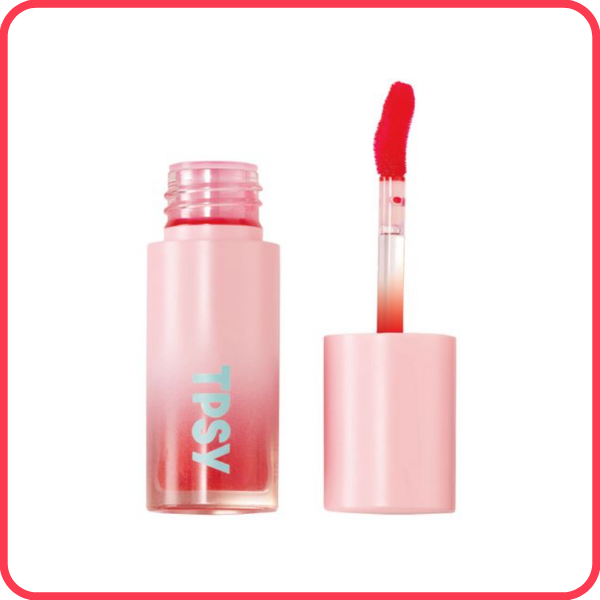 Open tube of TPSY lip oil in the shade My Boo, against a white background with a bright pink border