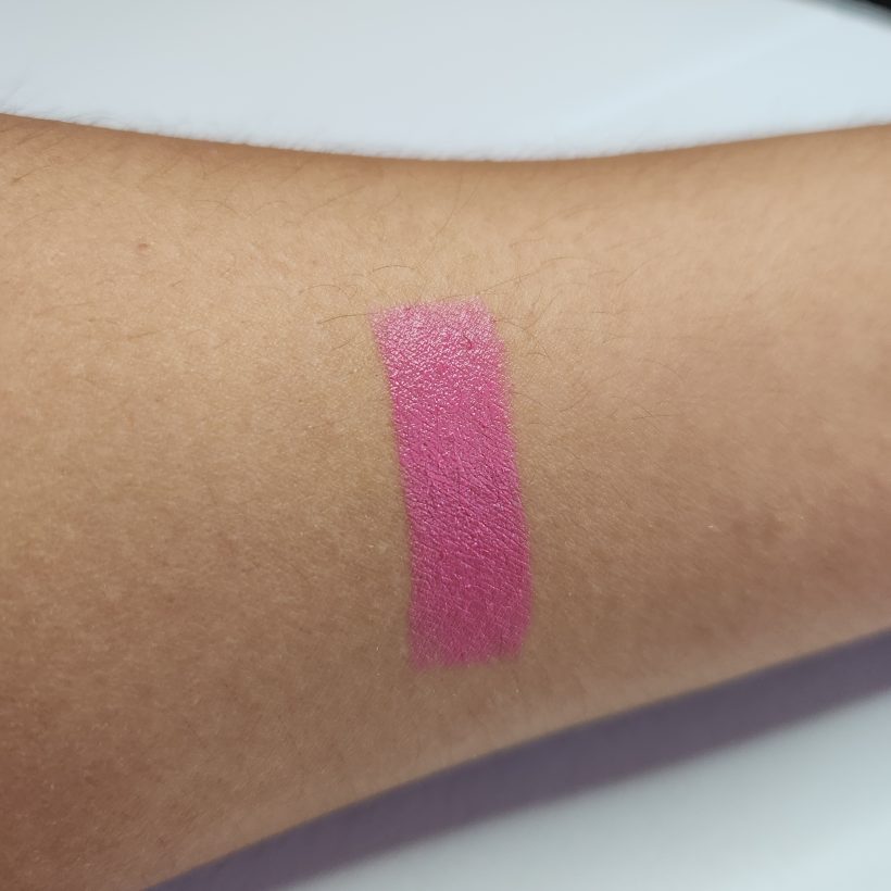 Arm swatch showing the shade Rose Angel in Avon's Glimmer Satin Lipstick