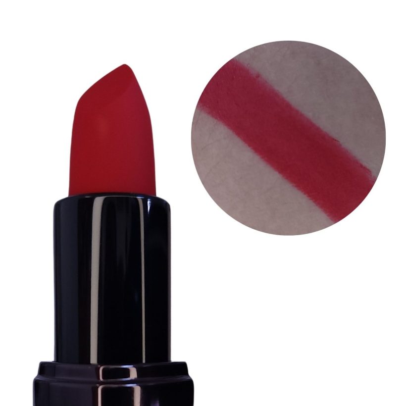 Open tube of bright red lipstick with only the top half showing, next to a arm swatch of the same shade