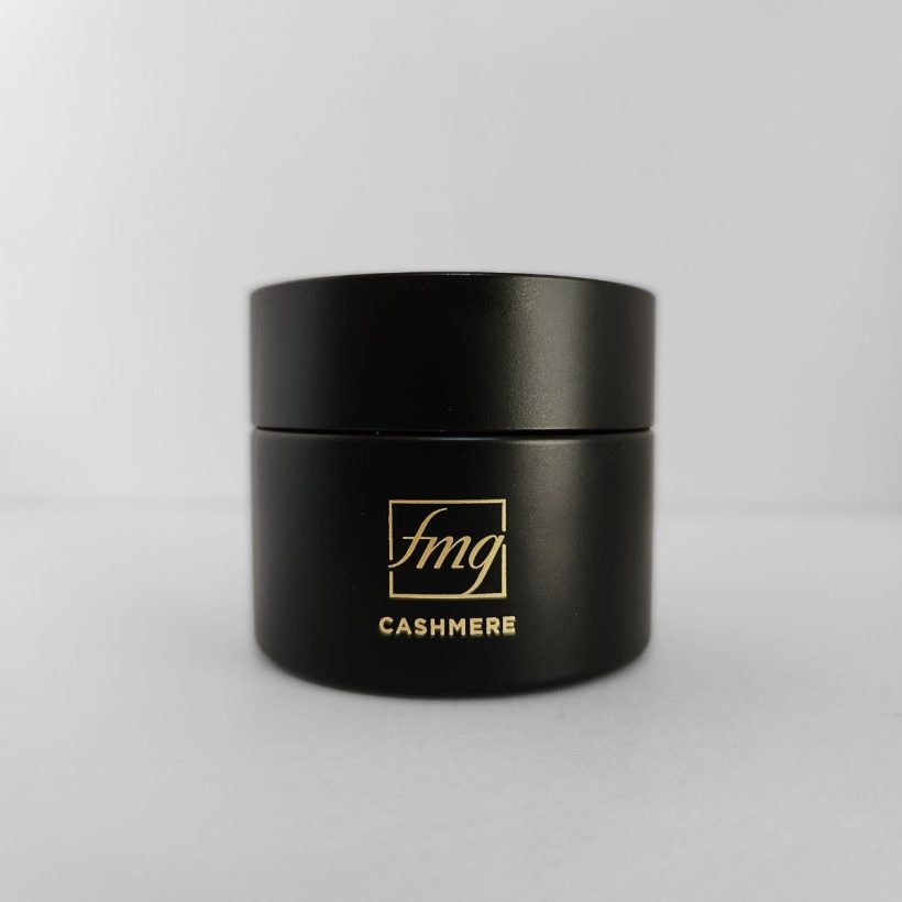 Package of Avon's Cashmere Multi-Balm, against a white background