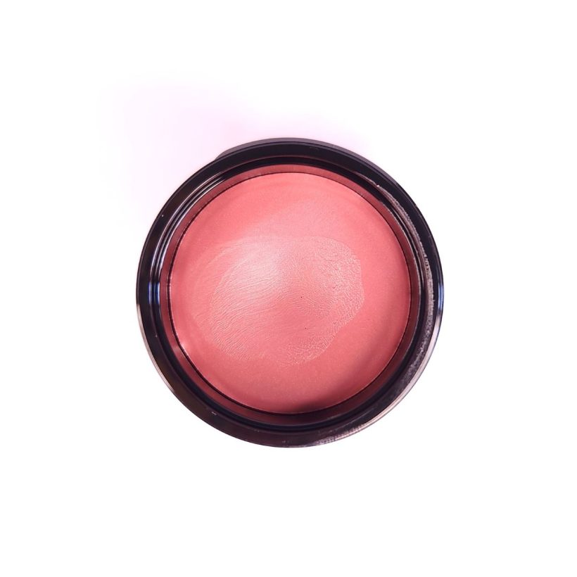 Open tub of Cashmere Multi-Balm in the shade Bouquet, against a white background