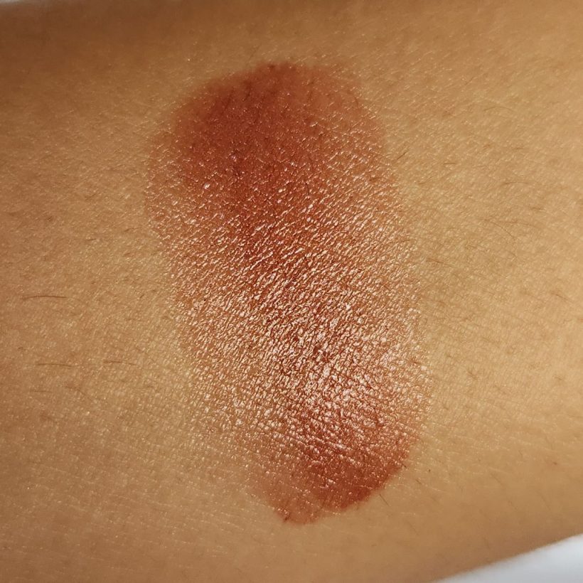 Arm swatch showing the color of the Cashmere Multi-Balm in the shade Cranberries.