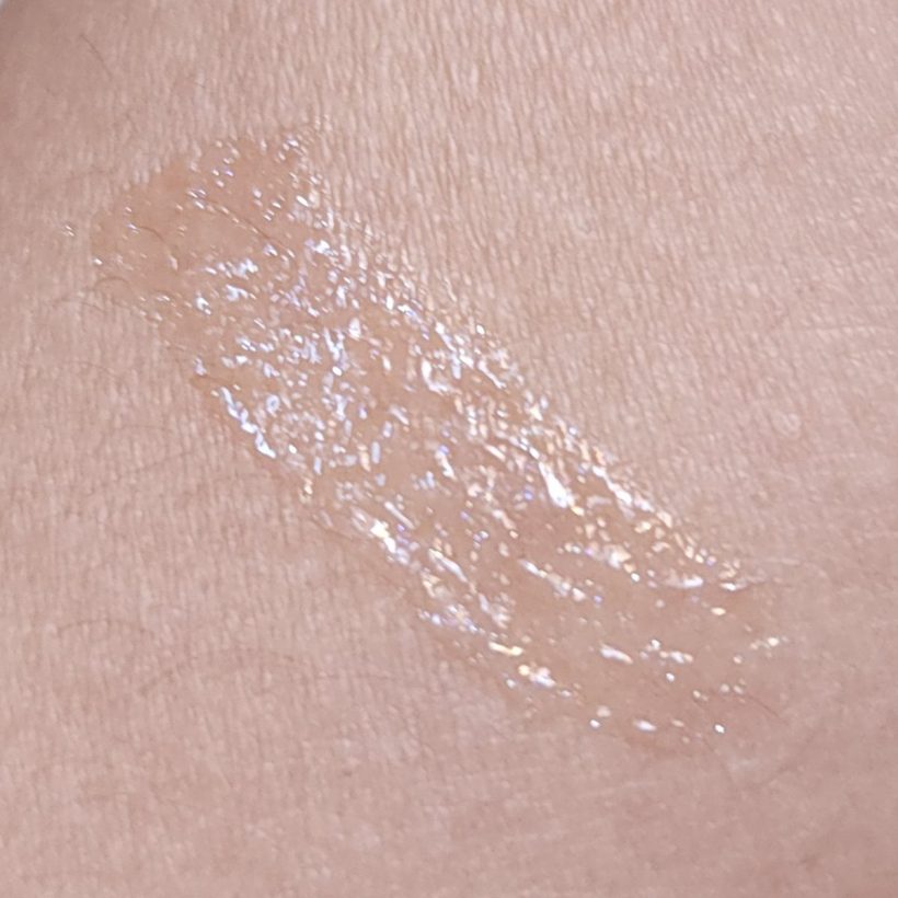 Arm swatch showing Glimmer Lip Gloss in the shade Stardust